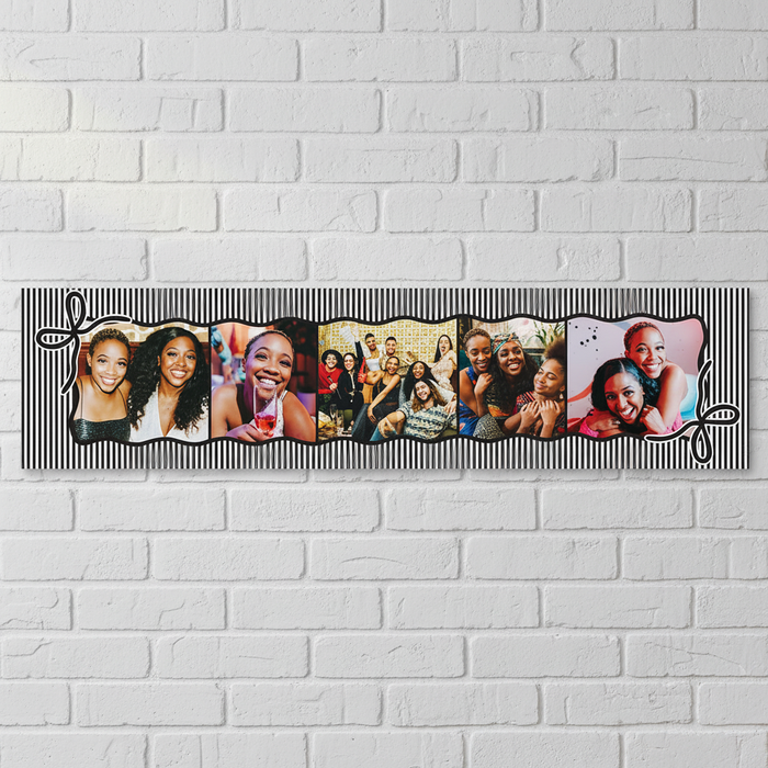 Close-up birthday banner on a white brick wall