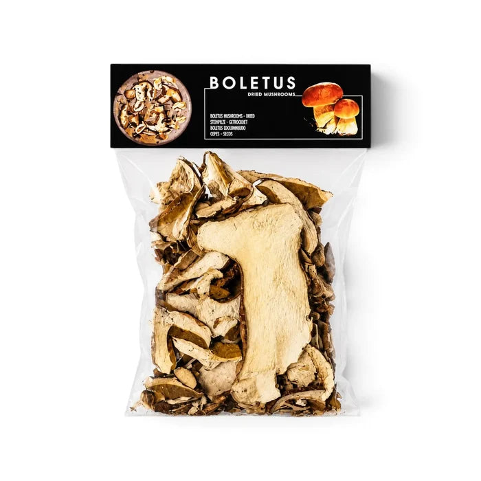 Dried porcini mushrooms (Boletus edulis) in a clear bag with a black Terra Ross label