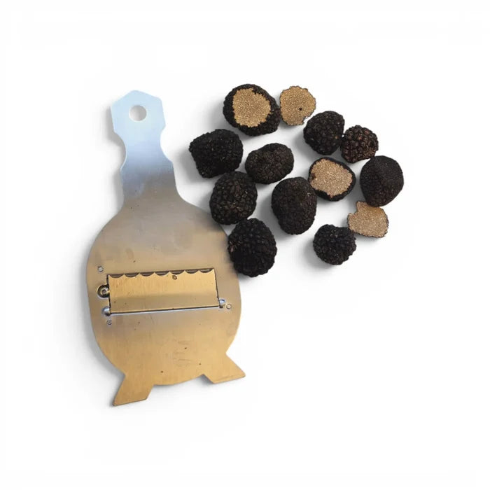 Fresh Tuber aestivum B Grade truffles showing small irregular whole specimens and a naturally cut interior