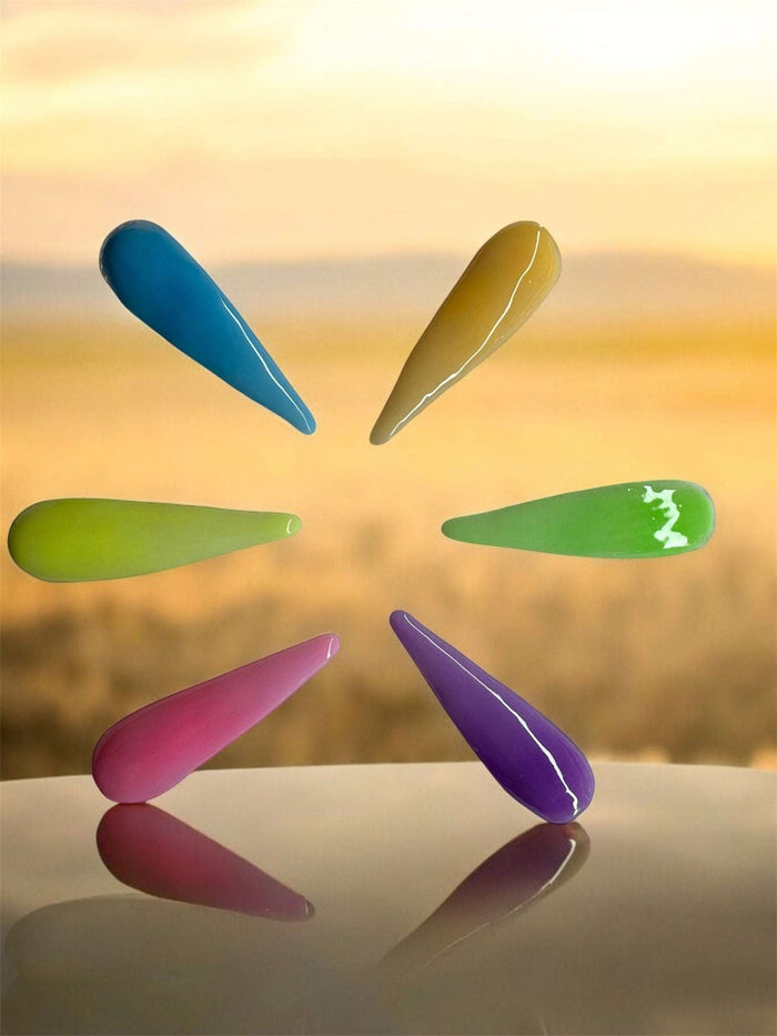 Glow in the dark acrylic nail powder collection with neon colors