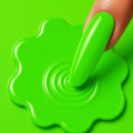 Green nail polish being applied to a green applicator on a green background