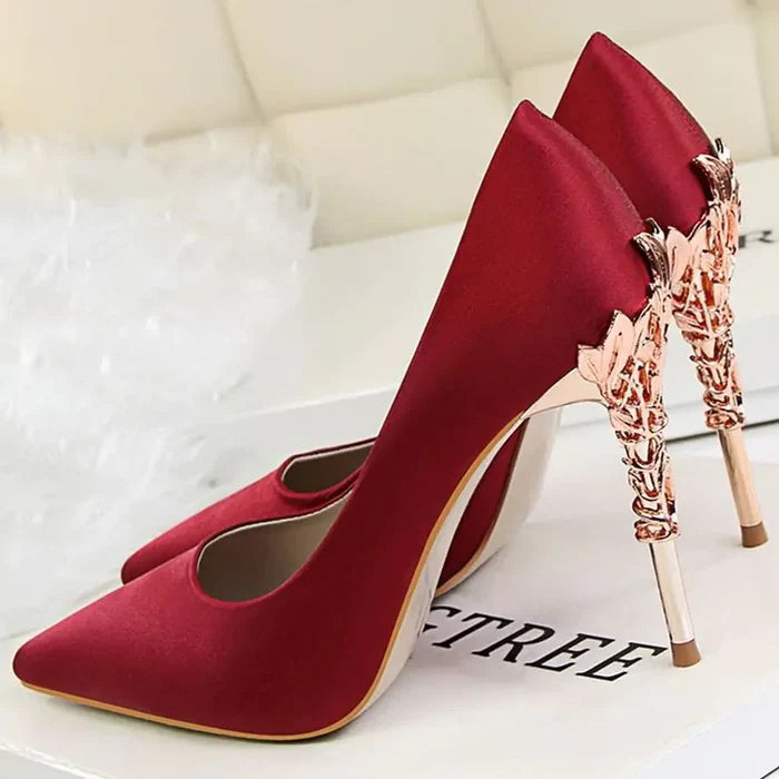Pointed heels showing metal decoration detail