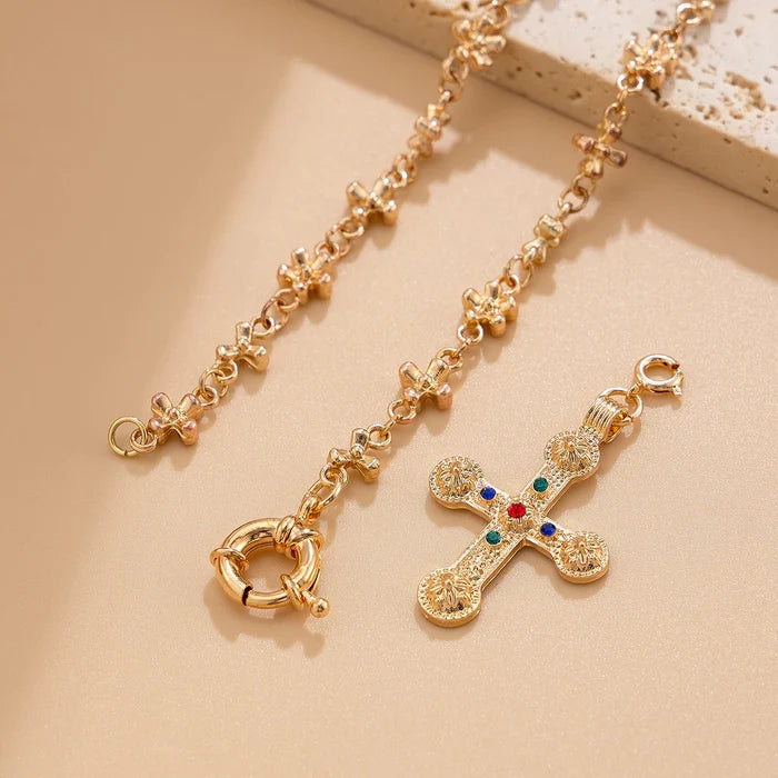 Close-up of vintage cross pendant necklace chain